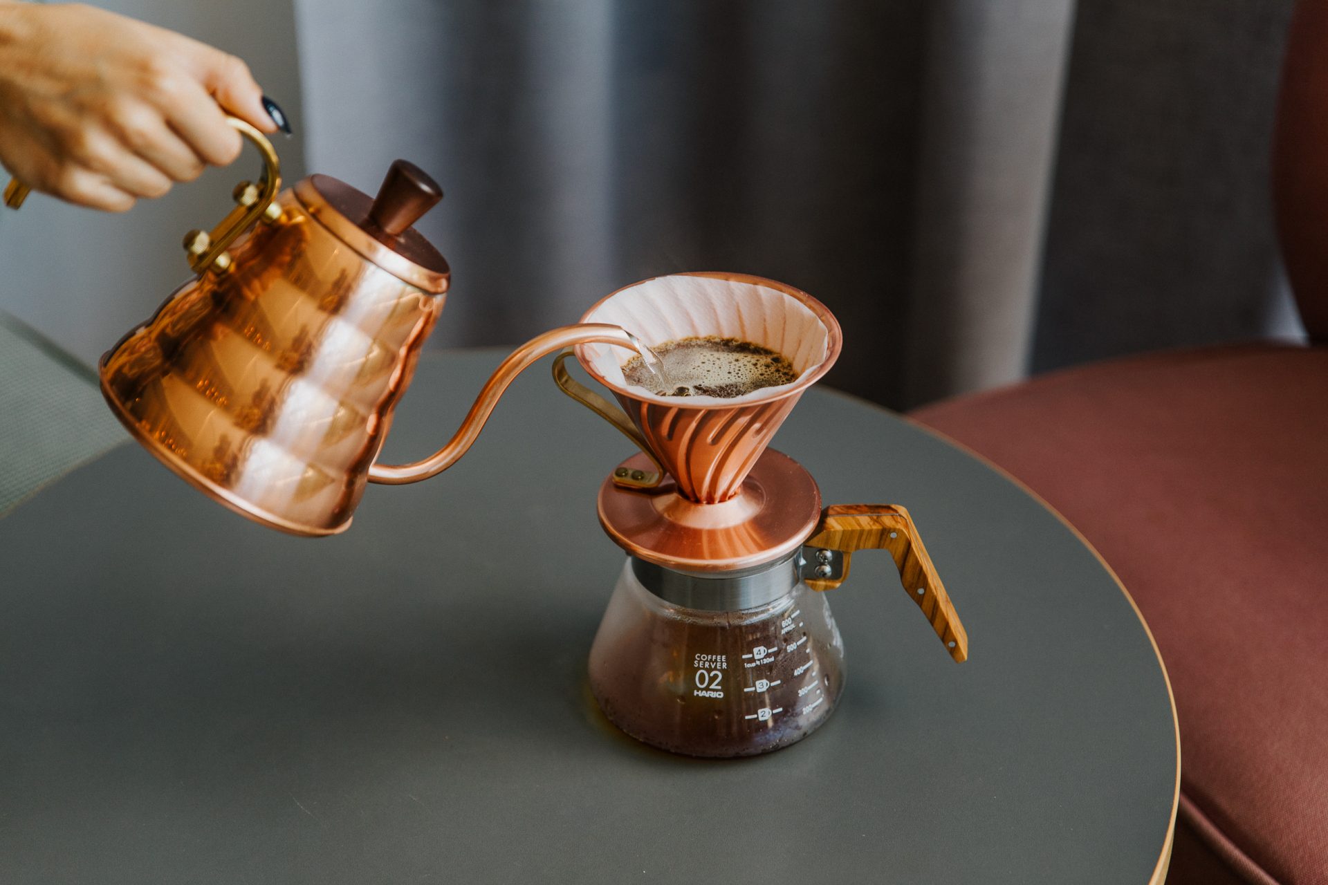 Pour-over brewing with a copper kettle and V60